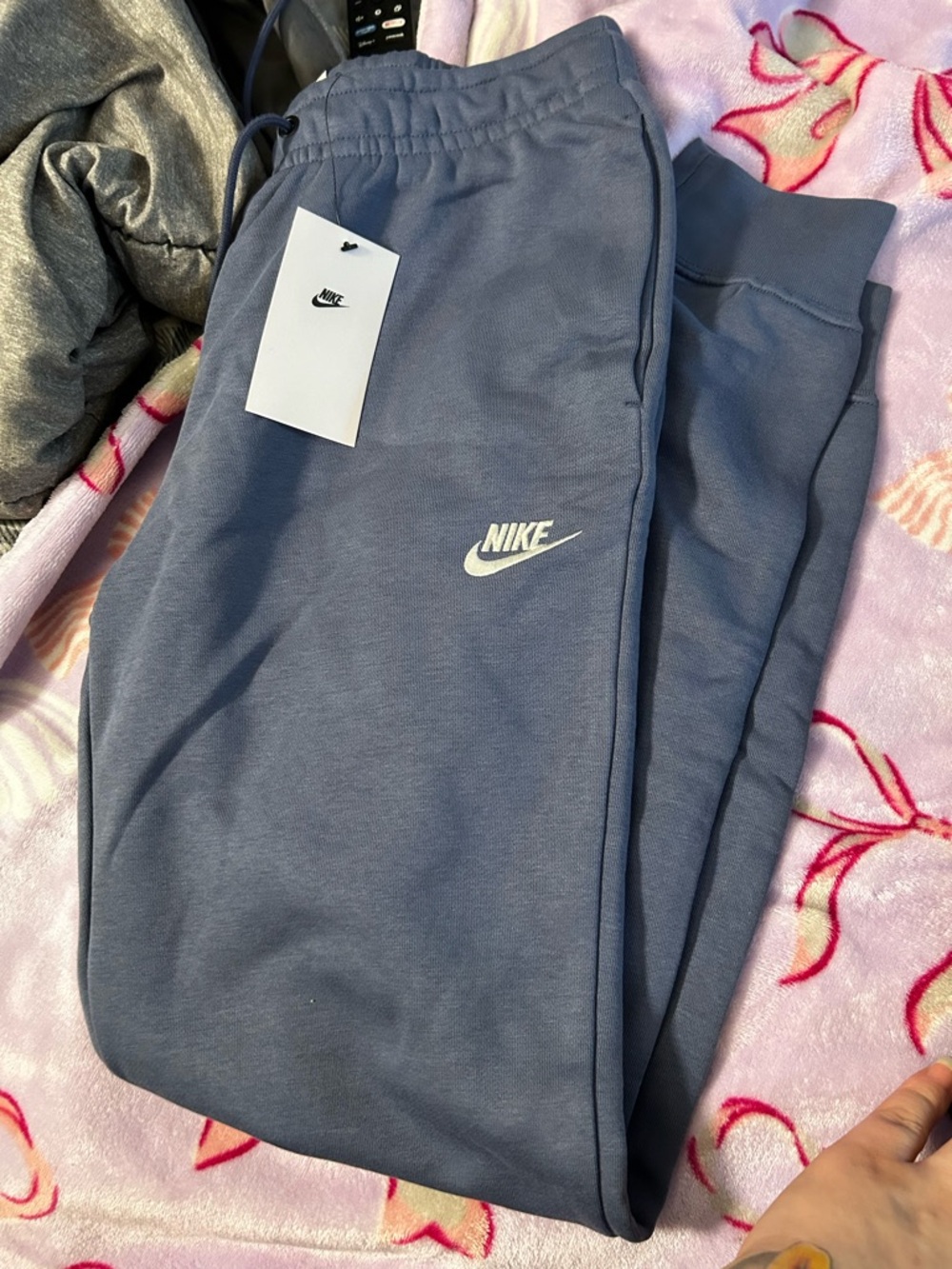 Blue/grey Nike joggers (Woman’s size Small)